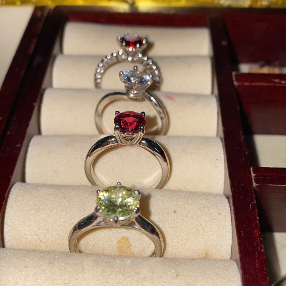 Four rings (NOT REAL DIAMONDS) sold altogether